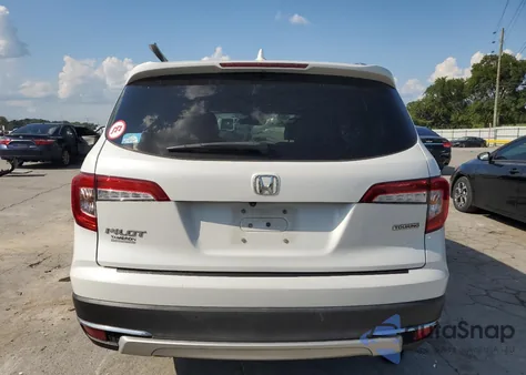 2021 Honda Pilot Touring from USA, damaged, VIN 5FNYF5H96MB011738